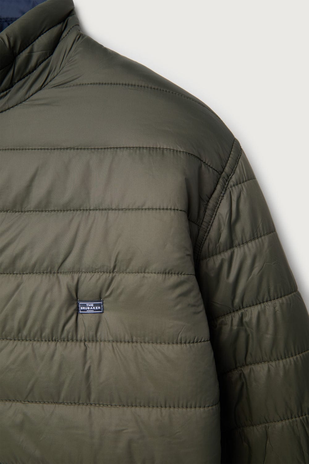 The Chaqueta Acolchada Khaki y Azul
