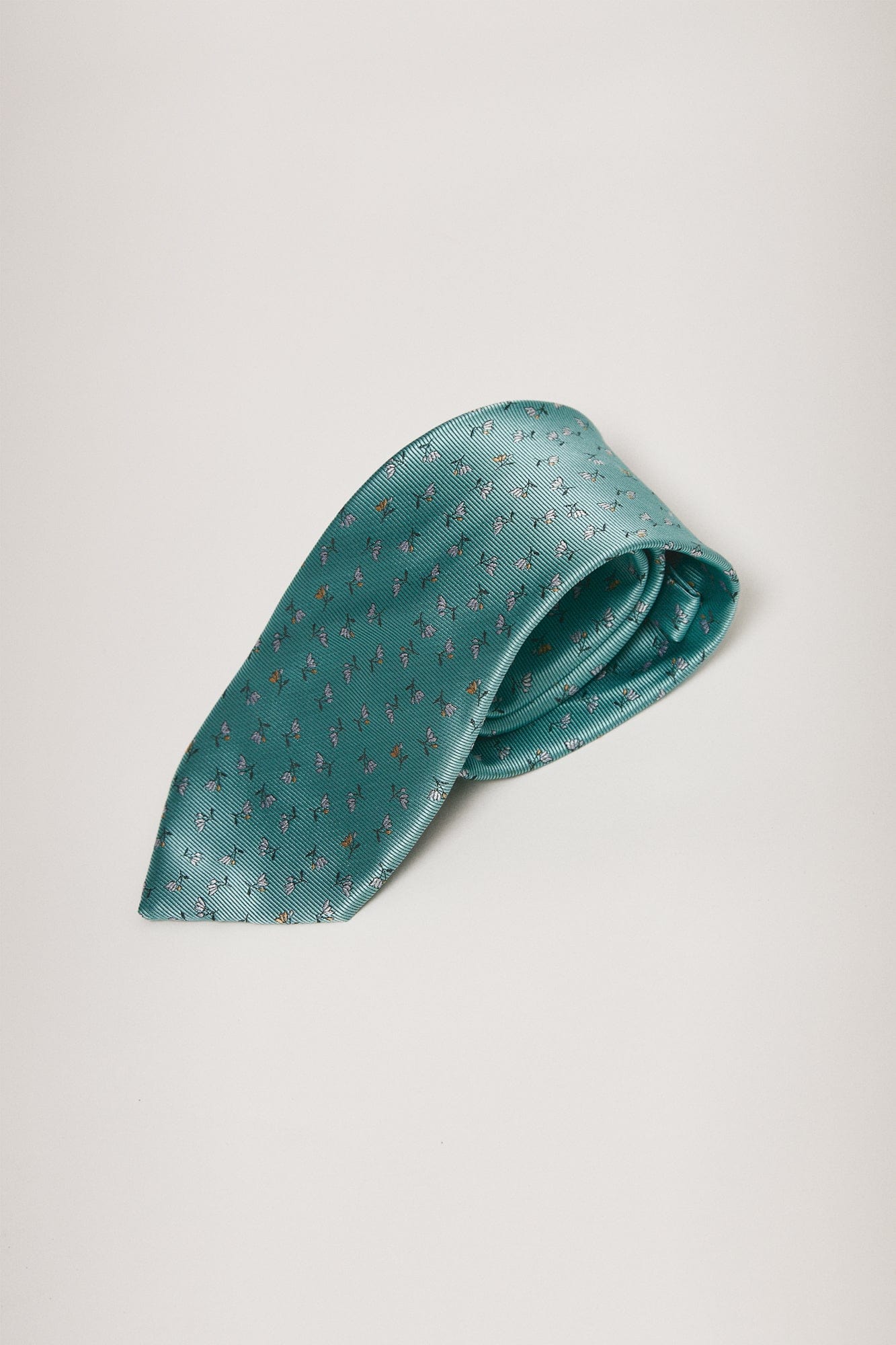 The Silk Tie Flor Fondo Turquesa-1